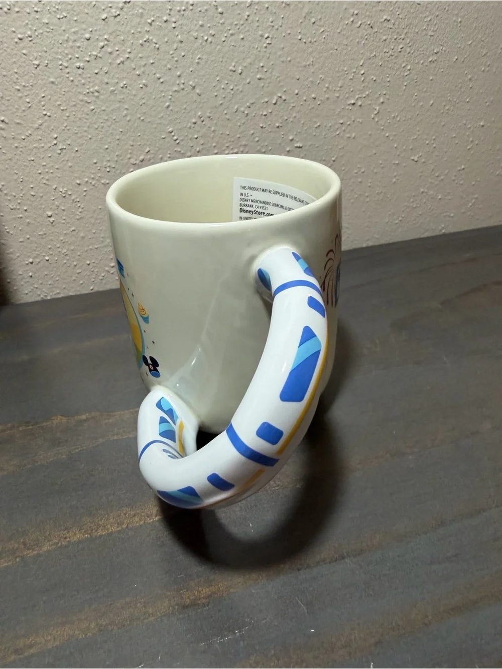 Disney mug w Mickey and Minnie featuring a monorail handle NWT